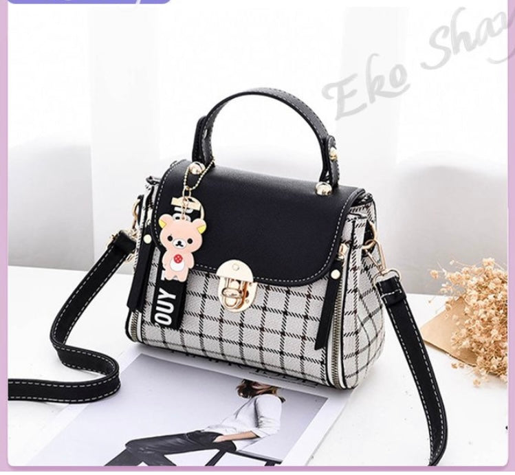 Chic and Modern Women’s Handbag with Adjustable Strap